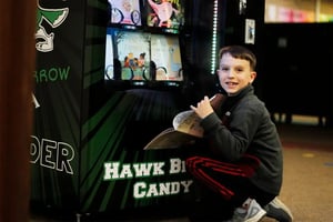 Hawk ES Student uses book vending machine