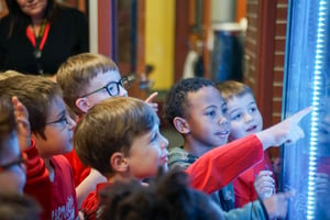 Pointing at book vending machine