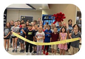 book-vending-machine-ribbon-cutting-kids